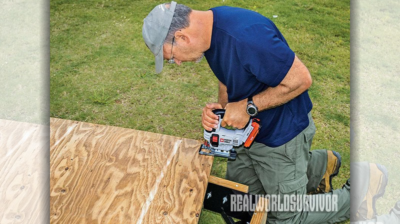 A jigsaw makes fitting the plywood floor into the frame easy.