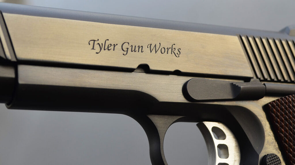 “Tyler Gun Works” is engraved on the side of the 1911’s slide.