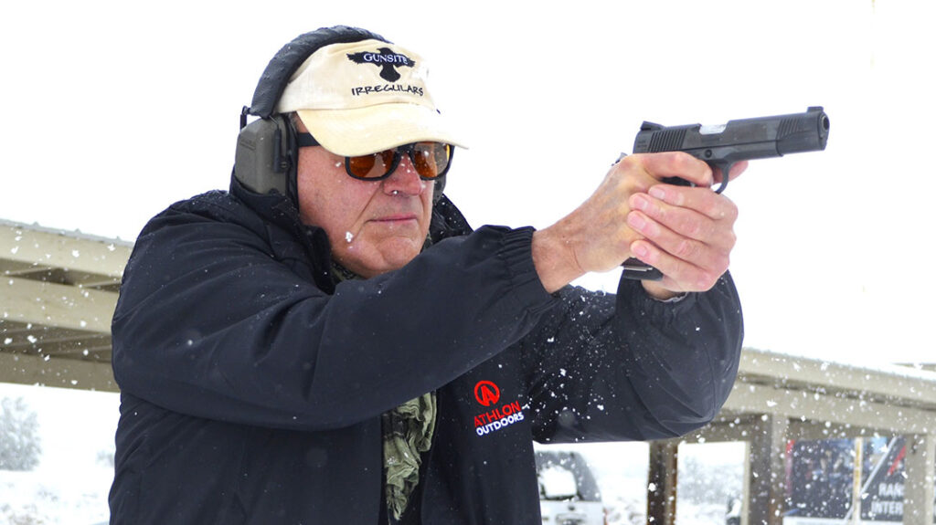 The author shooting the Tyler Gun Works 1911 at Gunsite.