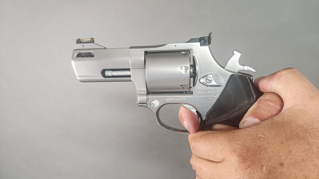 How to Operate a Revolver: In double-action revolvers, the trigger performs two functions: cocking the hammer and releasing it to fire the round.