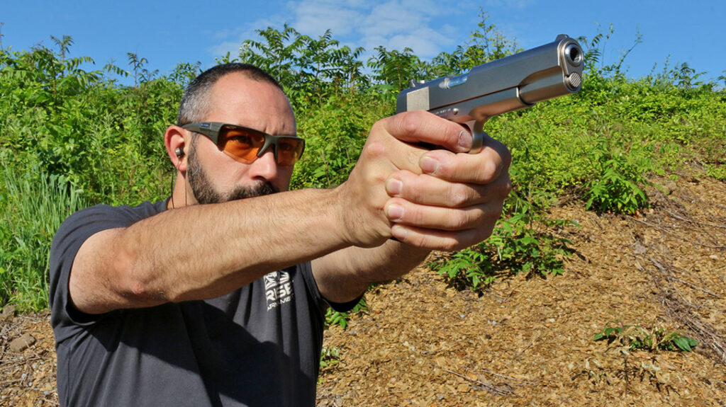 The author shooting the Tisas Stakeout.