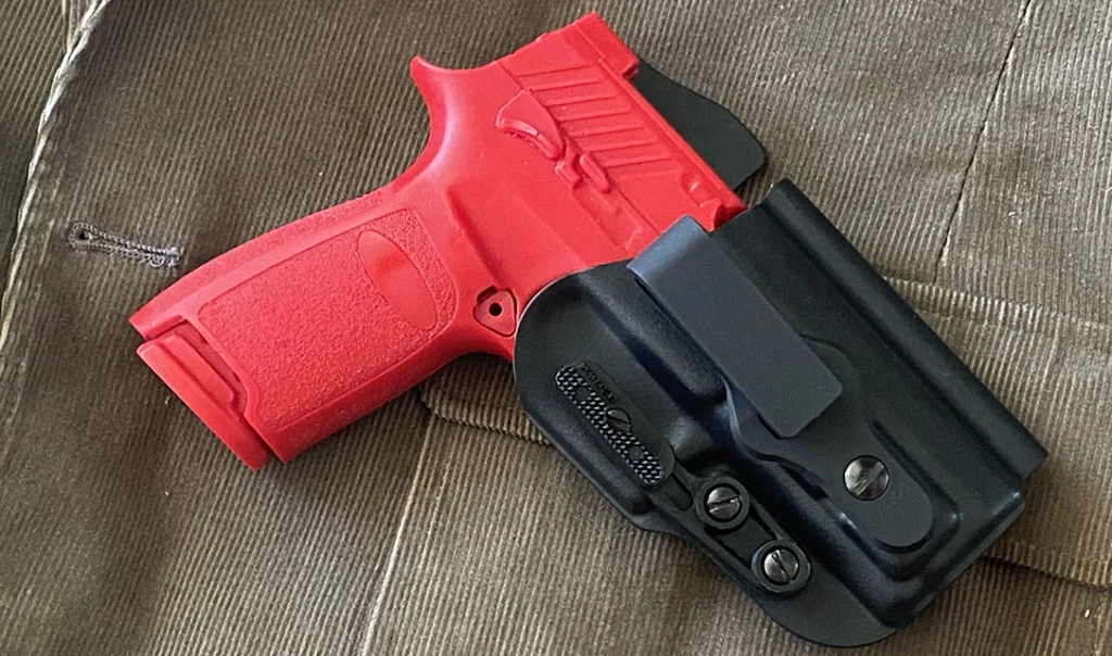 M18 training pistol in Galco Triton 3.0 IWB holster. Training firearms are invaluable for concealed weapon training, allowing you to practice skills safely without the risk of accidental discharge.