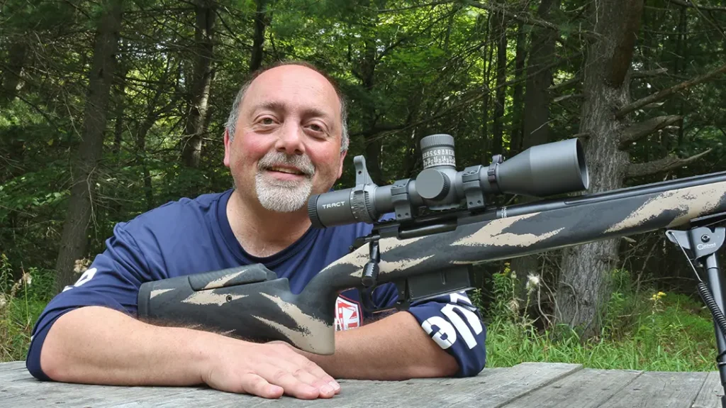 Jon LaCorte with a mounted Toric Eagleman LR Hunting Scope on a bolt-action rifle. 