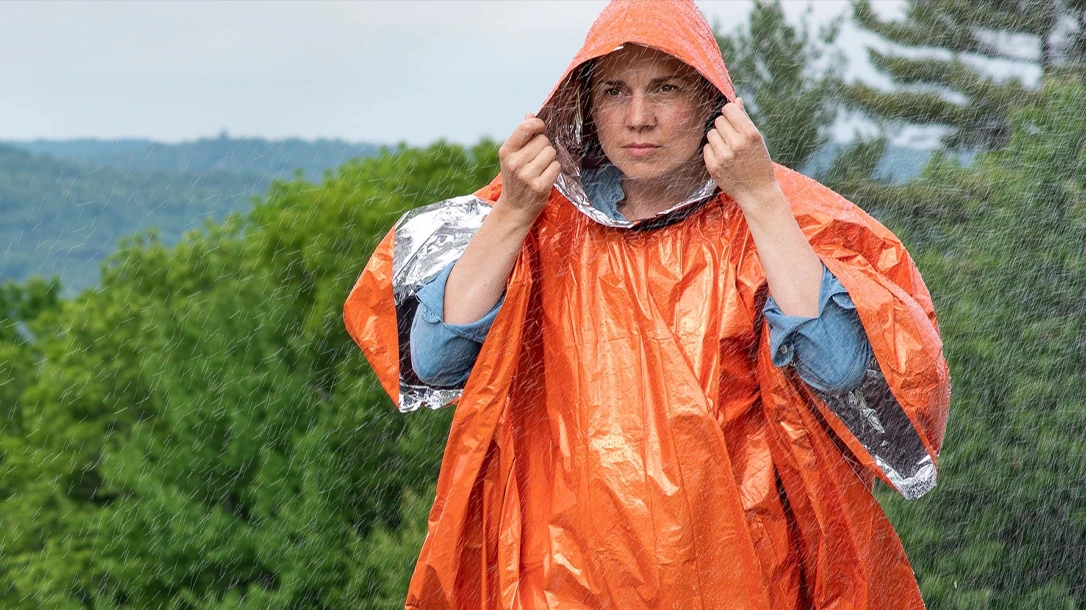 The SOL Heat Reflective Poncho is the easiest shelter for hunkering down and waiting out a storm or until possible rescue.