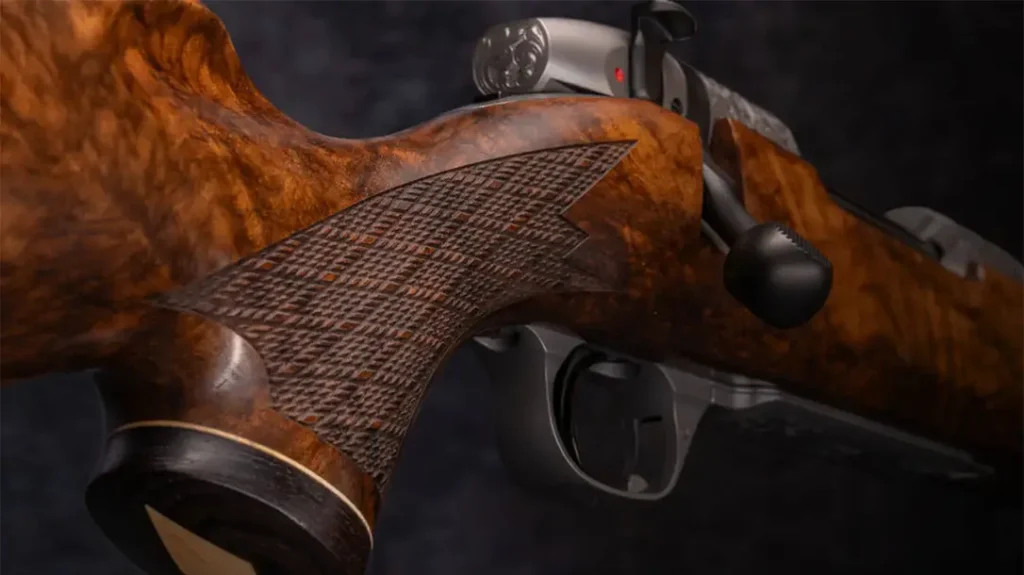 The Weatherby 80th Anniversary has a clean checkered stock.