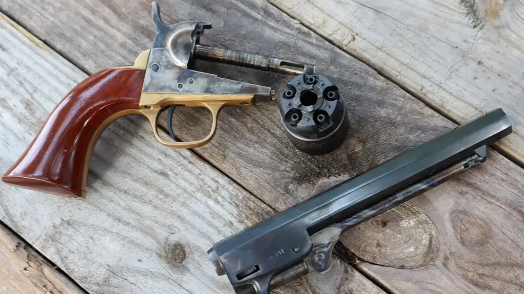 The Colt 1862 Pocket Navy breaks open for loading.