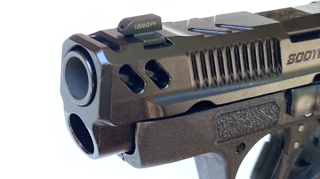 Additional dual diagonal cuts on the sides of the slide’s nose seem more about lightening the slide than venting gas.