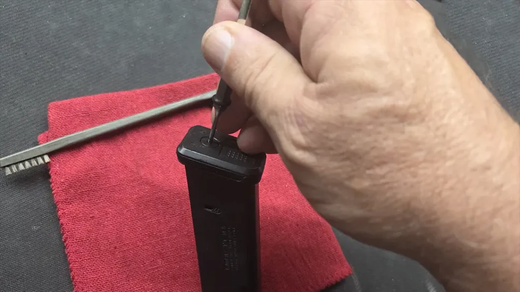 Handgun Magazine Maintenance involves disassembling the mag.