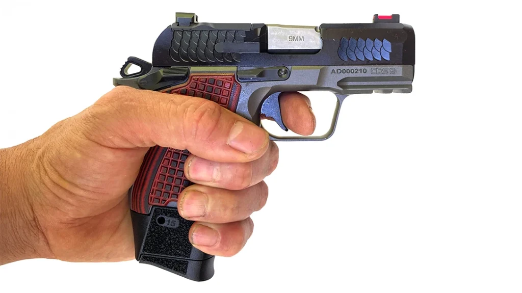 The grip design features a slight undercut at the rear of the trigger guard that goes more deeply into the front strap.