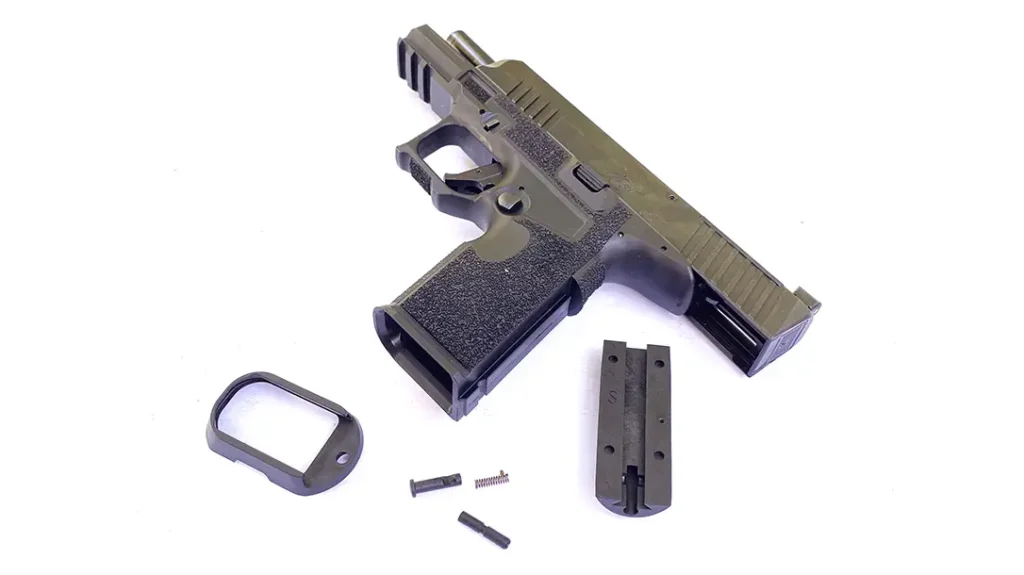 The magwell-flaring curves comfortably around the bottom of my pinky, but it is easily removed if it crowds your fingers.