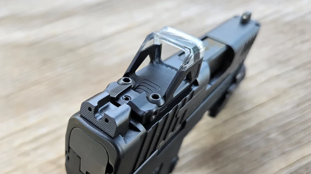 The author went with the Shield OMSsc red dot on his pistol.