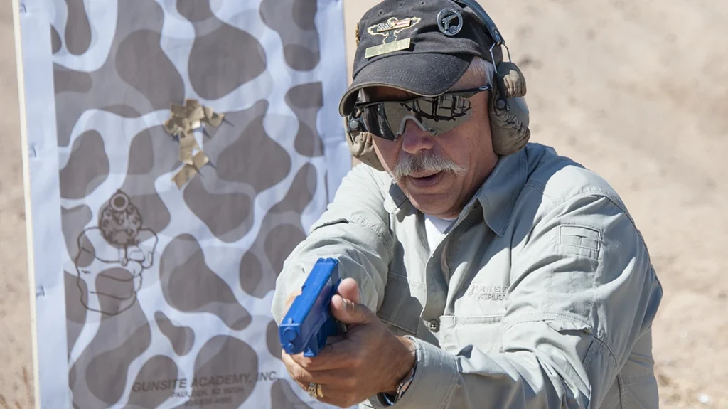 Post Shot Sequence: Typical low ready at Gunsite Academy.