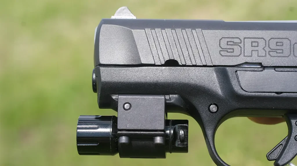 If the light protrudes from under the front of the pistol, like this Ruger SR9 Compact, it can create life-saving “stand-off capability” on a body contact shot.