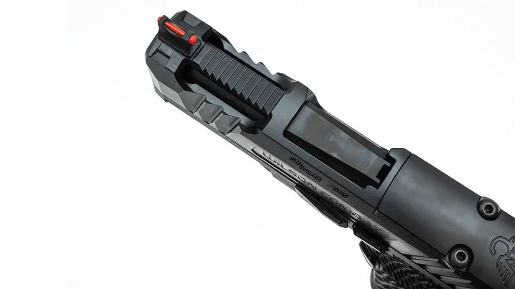 The proprietary X-TAC serrations were put aside in favor of more aggressive front and rear slide serrations.