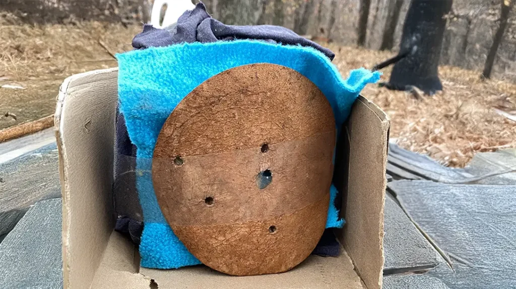 .380 ACP Meat Test: To simulate heavy clothing, I taped a layer of cotton shirt twill, thick synthetic hoodie fleece, and a piece of shearling leather to the face of the flesh target.