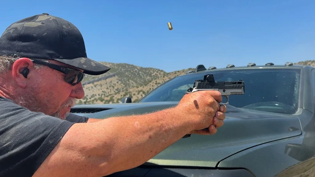 The author shooting his Sig Sauer P229 SA/DA legacy pistol.