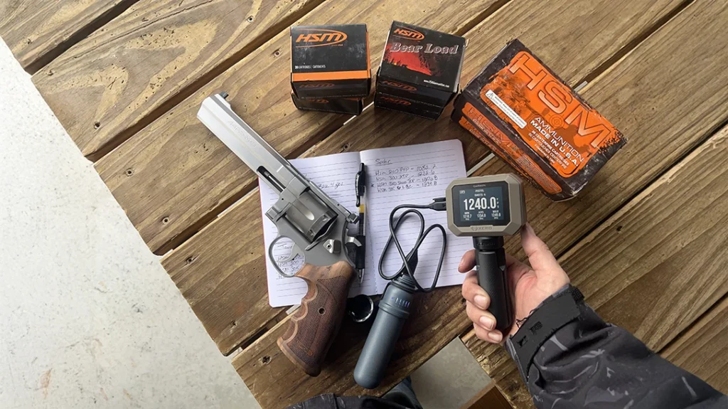 The author ran a cross-section of HSM cartridges at 50 yards and captured velocity data with a Garmin Xero chronograph.