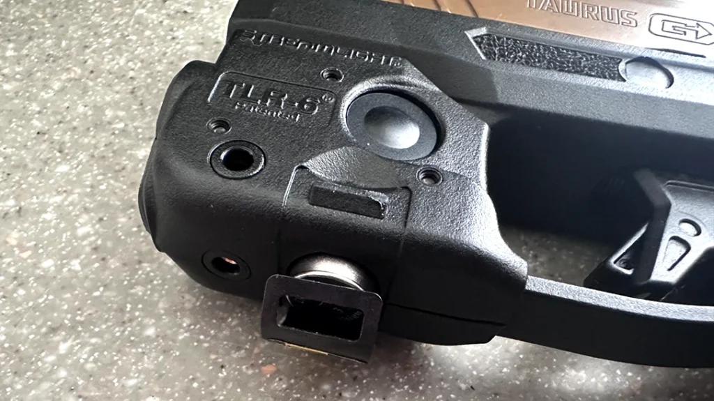 With the second half, the author aligned it onto the trigger guard, applying minimal pressure to ensure the two sections joined together.