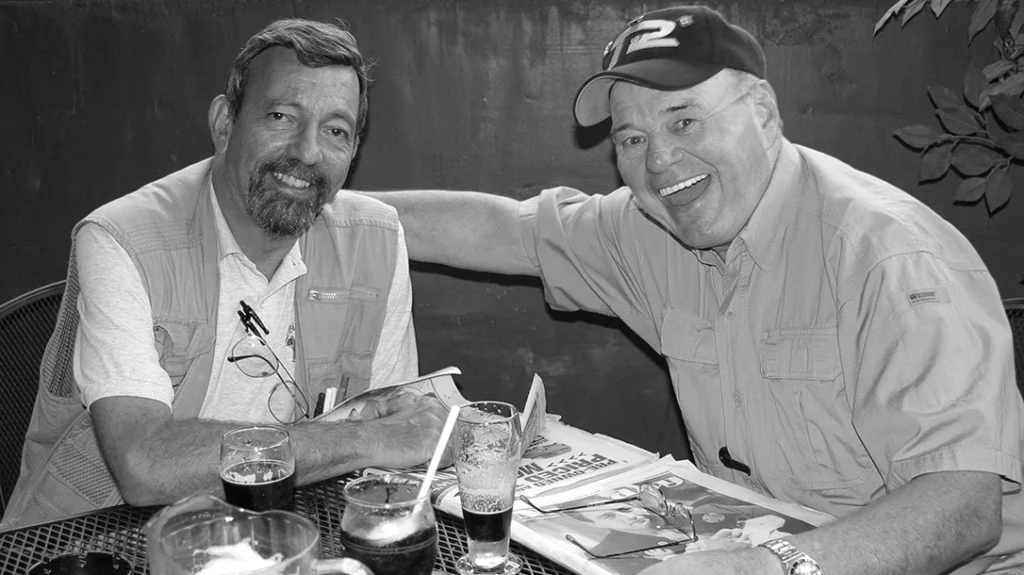 Author, left, debriefs master gunfighter Bill Allard of the NYPD Stakeout Unit, a strong advocate of competition shooting as a component of gunfight training.