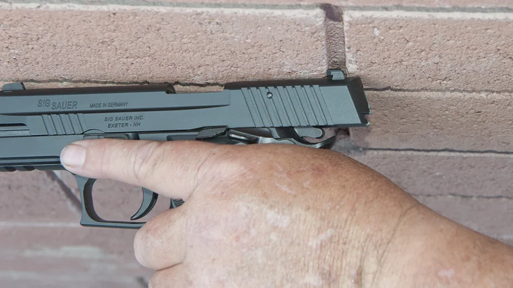 Buildings provide guard rails, fences, and even openings in brick walls to run a pistol slide.