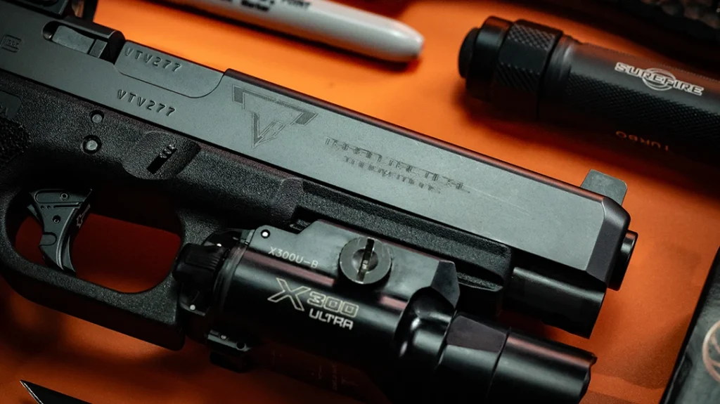 The heart of the pistol remains stock, and the slide is a factory Gen 3 Glock 34 slide with TTI badging.