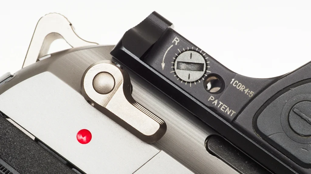 The slide-mounted lever does not function as a safety. Instead, it is a decocker only.