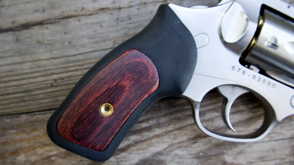 The Lipsey’s .327 Ruger SP101 Stainless has rosewood panels.