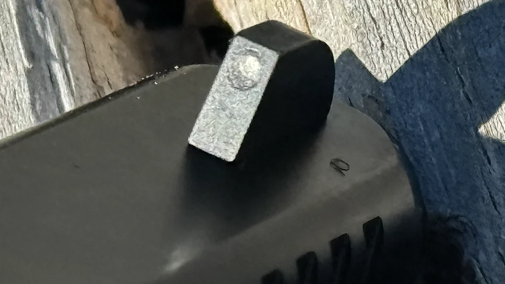 The front bolted on using the supplied screw and one of my many front sight tools for the Glock platform.