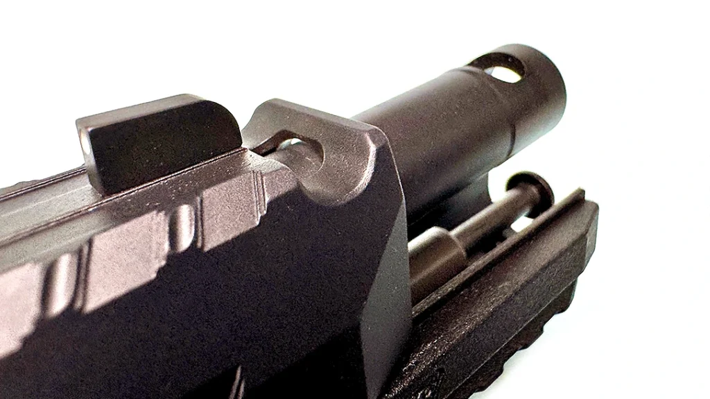 The common denominator here is that all three have a “port” cut into the slide and barrel, about 0.20 in from the muzzle.