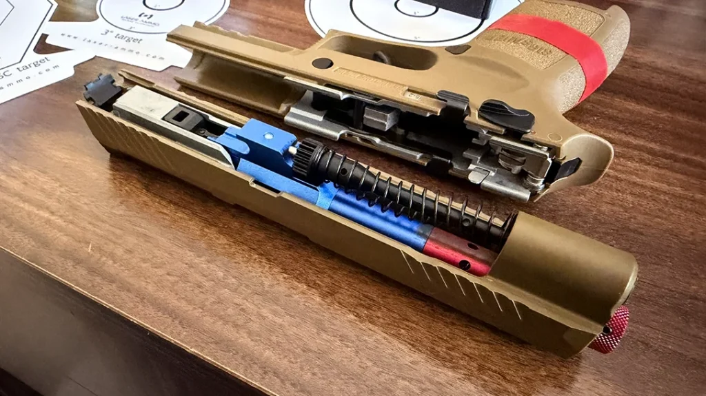The firearm disassembles similarly to its live-fire counterpart.